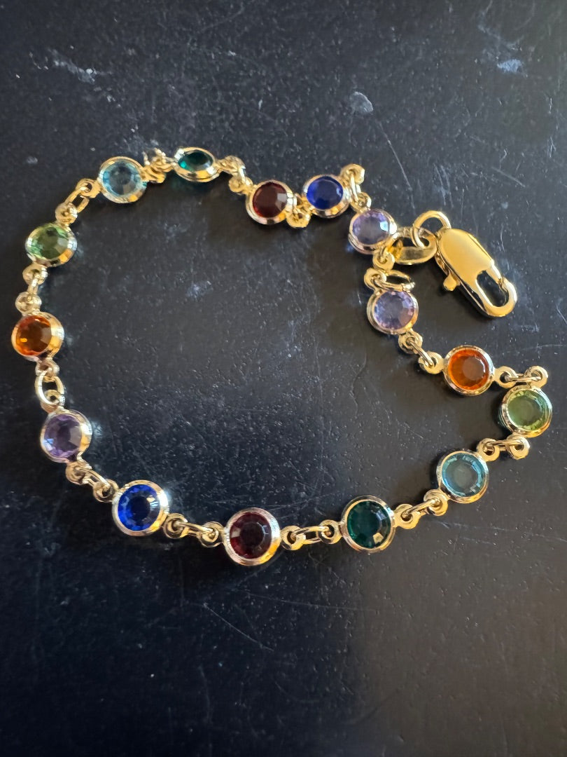 Gold tone circle multi color bracelet