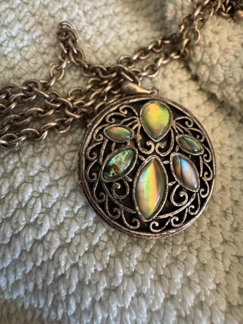 Silver tone abalone inlay filigree open locket