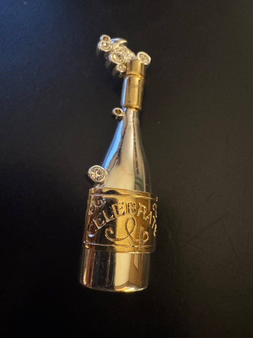 Carolee Celebrate bottle silver tone brooch