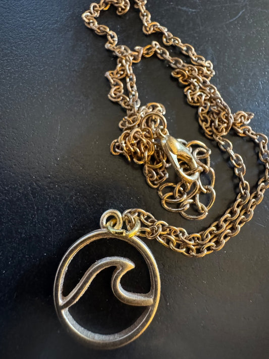 Wave gold tone necklace