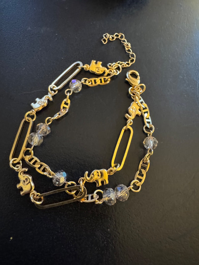 Double strand elephant paper clip gold tone bracelet