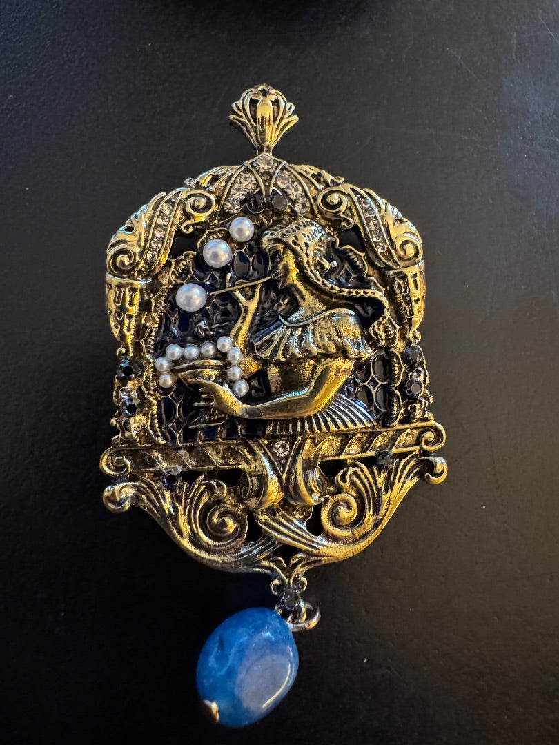 Woman blowing bubbles brooch