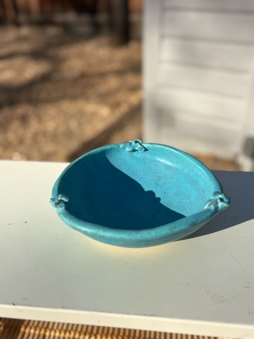 Handmade pottery blue bowl with flowers