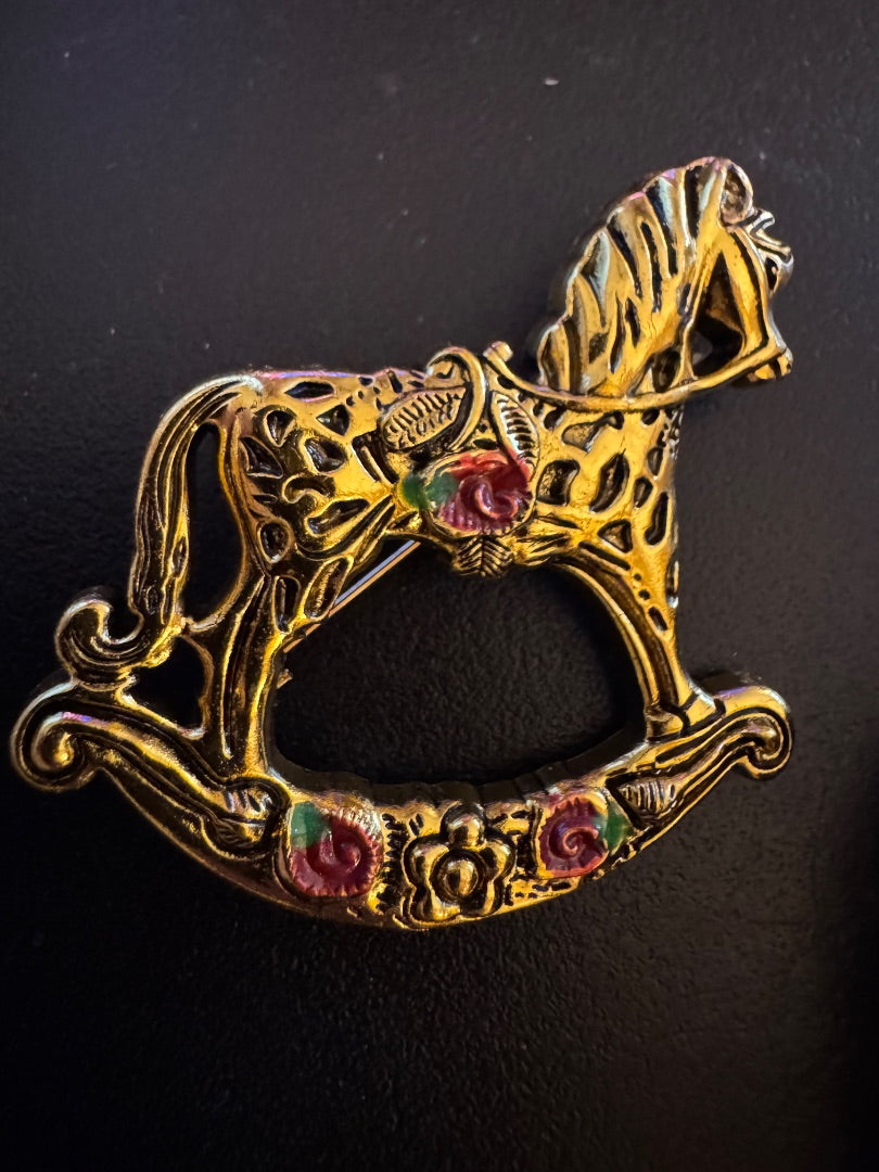 Rocking horse gold tone brooch
