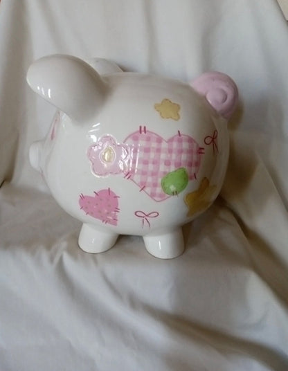 White piggy bank with pink