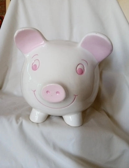 White piggy bank with pink