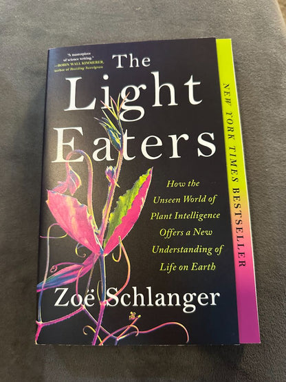 Paperback The Light Eaters, 8 x 4 x 1