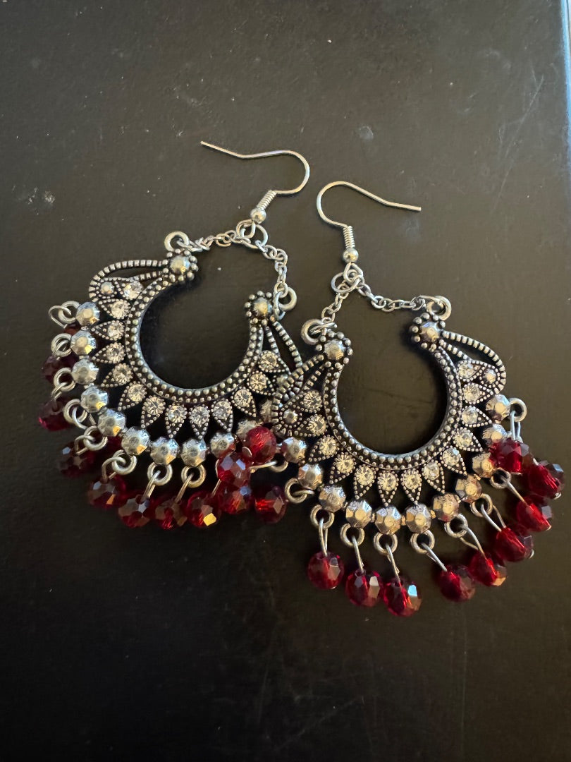 Red silvertone chandelier earrings