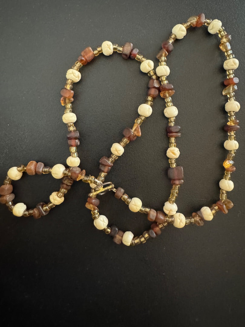 Dark tan & carved offwhite bead necklace