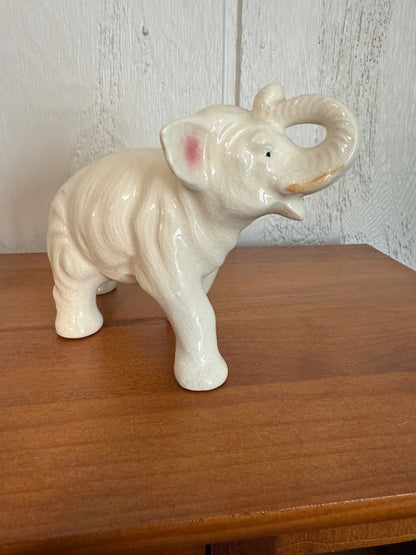White  Vintage Elephant Made in Japan, 4 1/4” tall, 5 1/2 wide