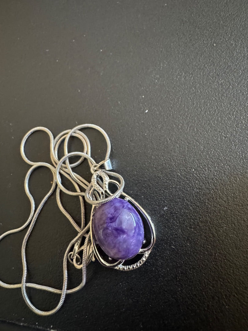 Purple cabochon stamped 925 pendent on silver chain