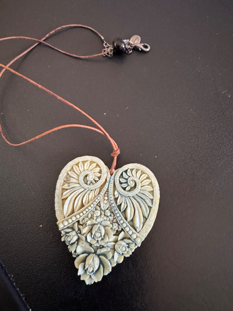 Bonnie J carved faux ivory heart necklace