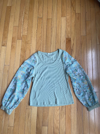Upcycled green shirt with lady novelty print sleeves