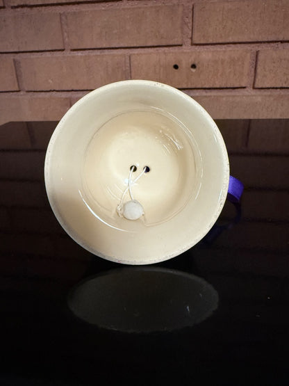 Cream MacBeth-Evans Ceramic Bell with Hedgehog, 3” tall, 3 1/2” wide