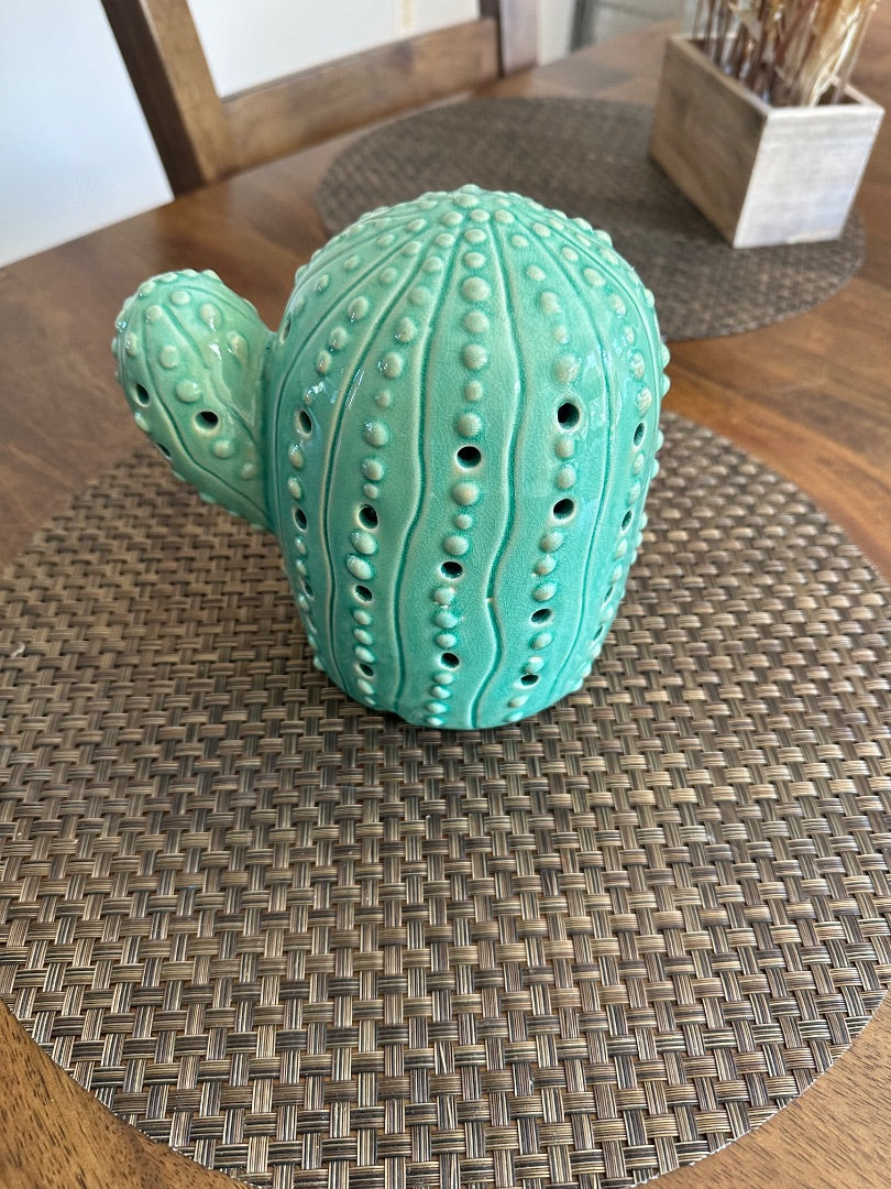Ceramic cactus lights up.