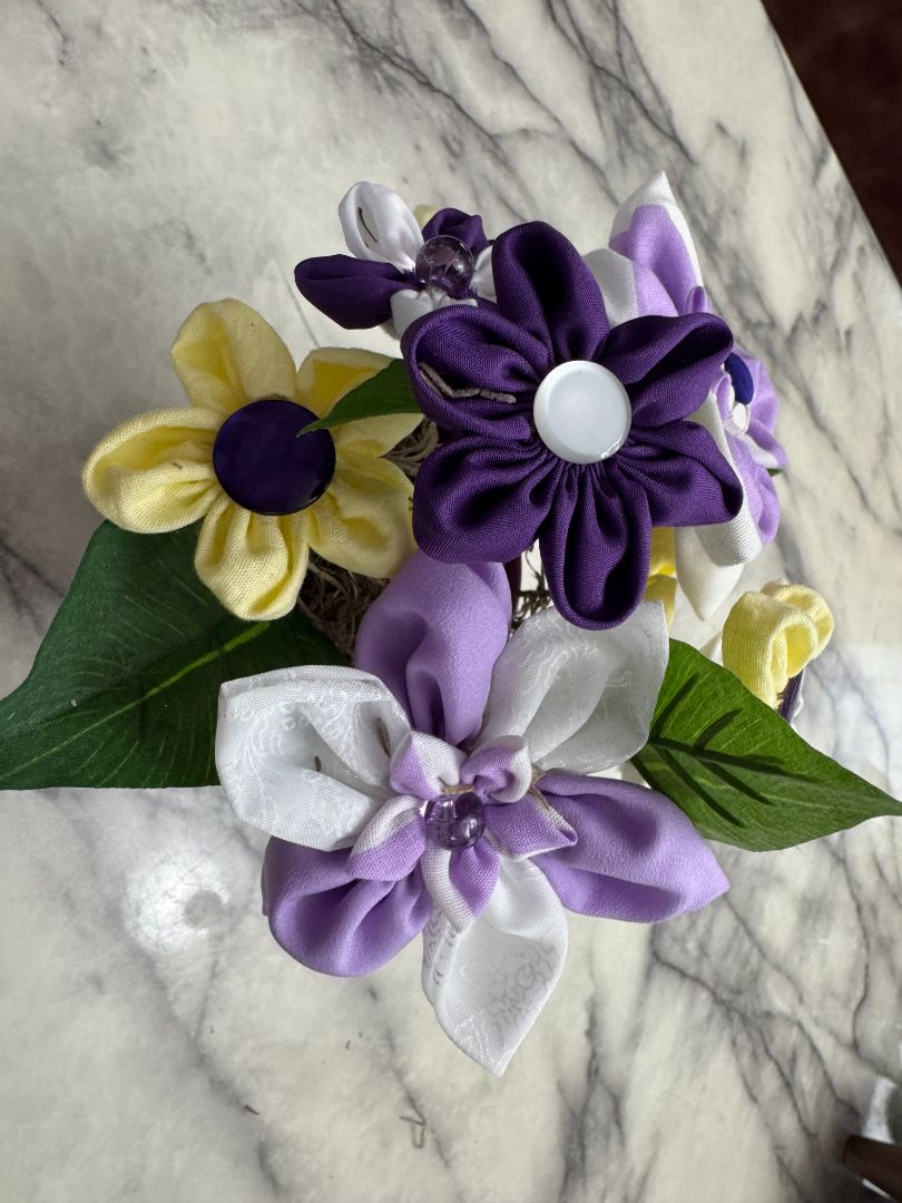 Purple, white and yellow  Hand made floral bouquet, 8" high x 7" wide