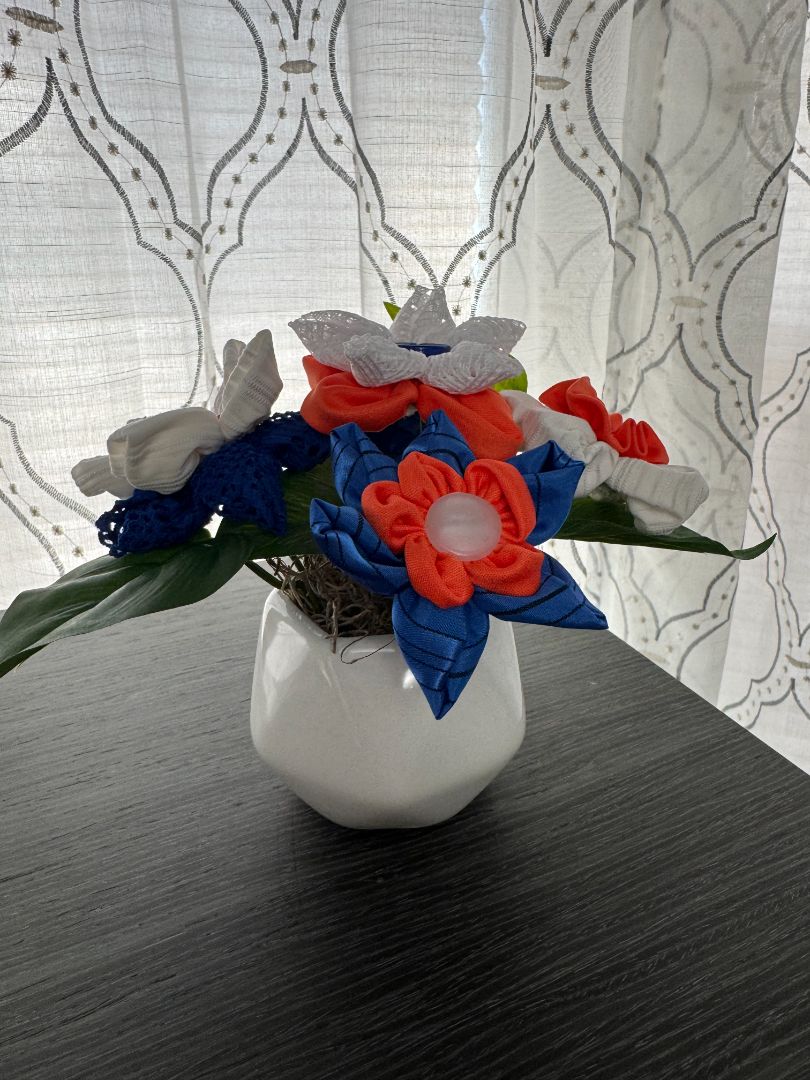White, orange and blue  Hand made floral bouquet, 6 1/2" high x 7 1/2" wide