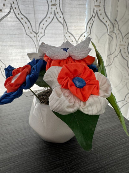 White, orange and blue  Hand made floral bouquet, 6 1/2" high x 7 1/2" wide