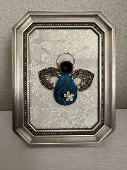 Silver, white, blue and black  Upcycled Guardian Angel, 8 1/2" high x 6 1/2" wide