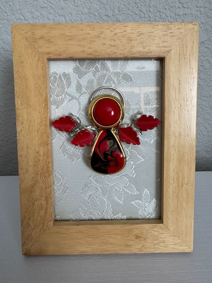 Red, white, gold, silver and blond wood  Guardian Angel, 6 1/2" high x 5" wide