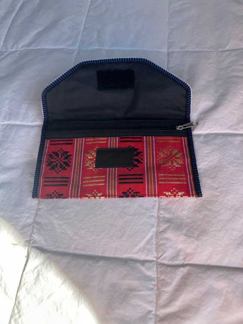 Clutch purse, red, black, and gold design