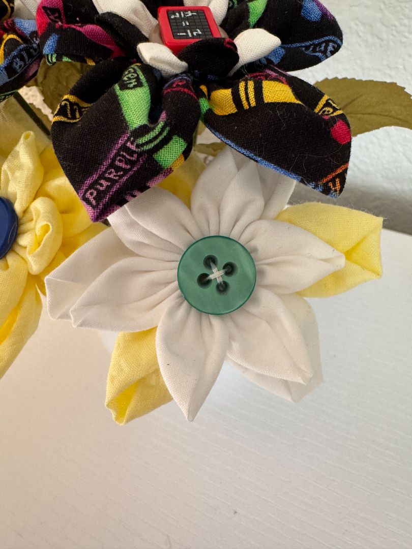 Yellow, white, blue, green, red and black  Upcycled hand made flower bouquets, 7" high x 7" wide