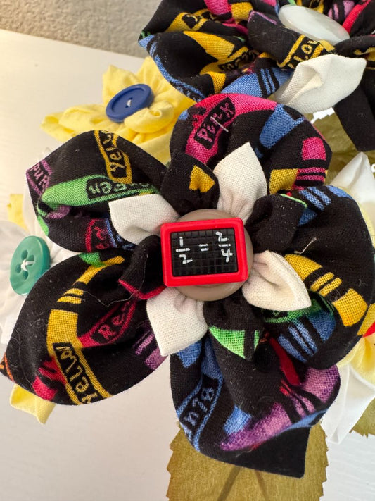 Yellow, white, blue, green, red and black  Upcycled hand made flower bouquets, 7" high x 7" wide