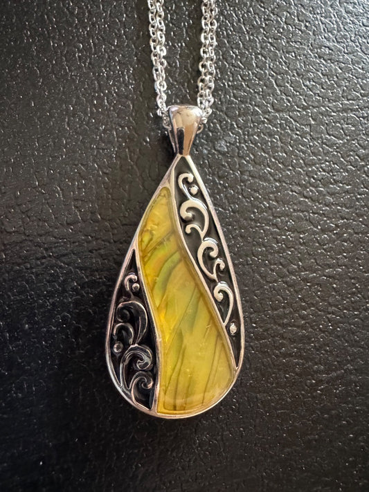 Yellow w/black cutout silver tone necklace