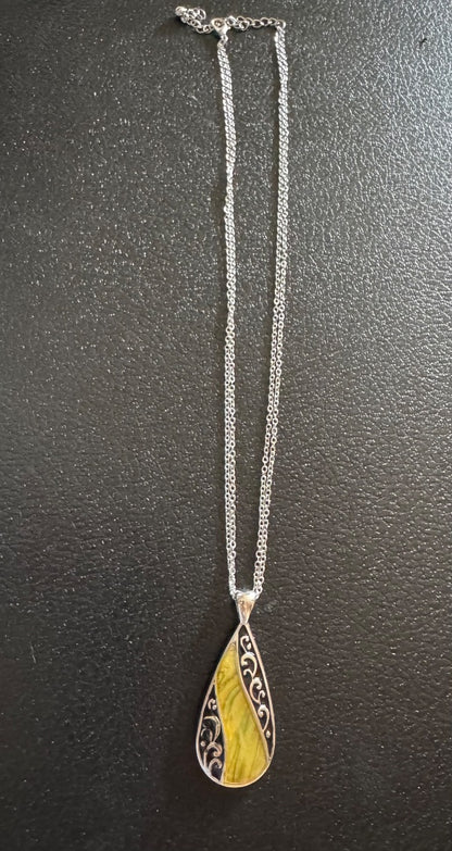 Yellow w/black cutout silver tone necklace