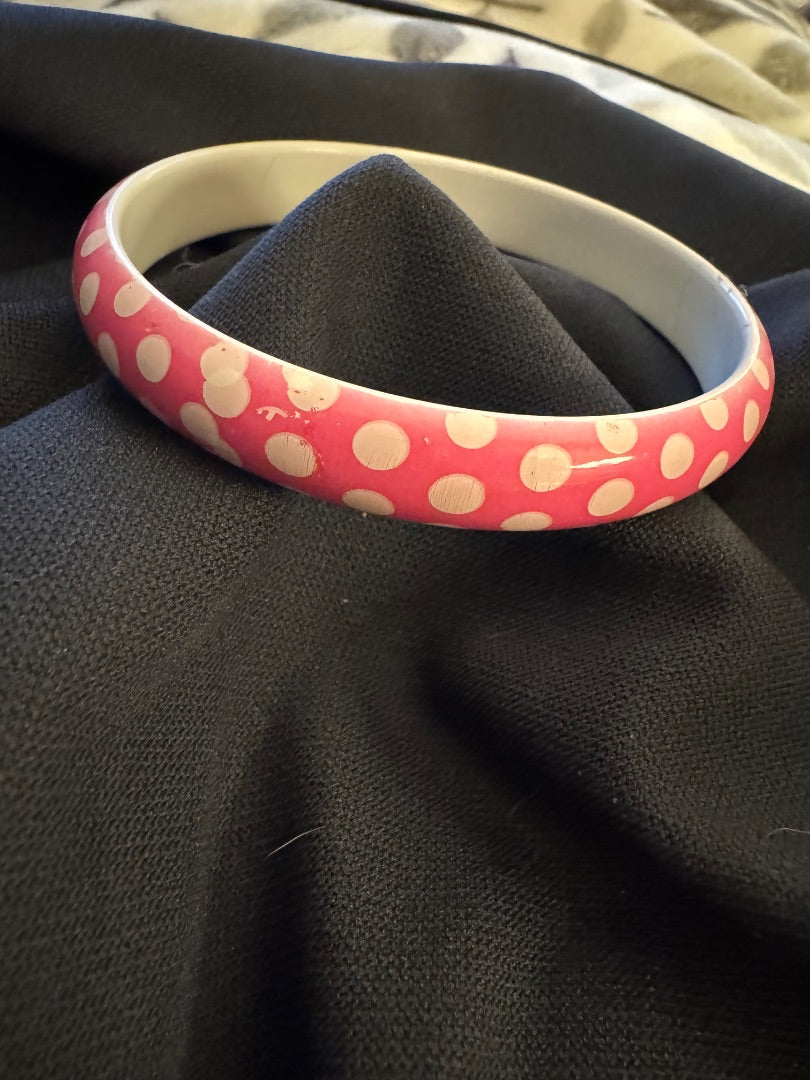 Plastic pink polka dot bangle bracelet