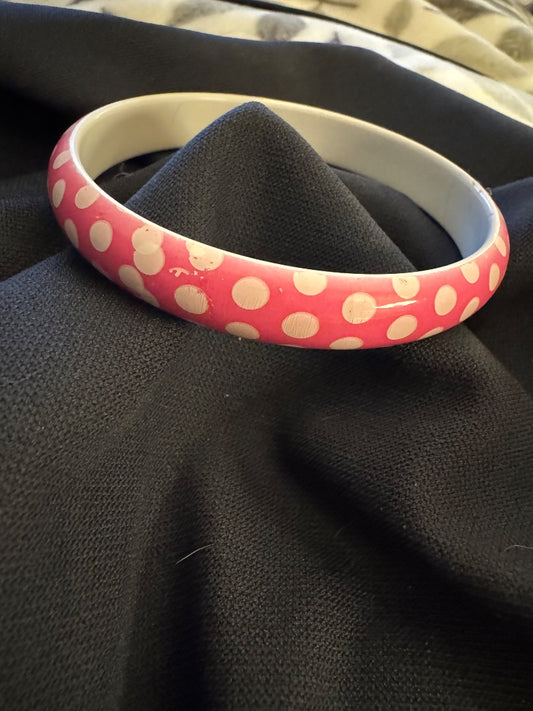 Plastic pink polka dot bangle bracelet