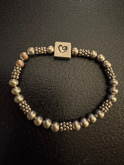 Silvertone H/Heart stretchy bracelet