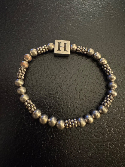Silvertone H/Heart stretchy bracelet