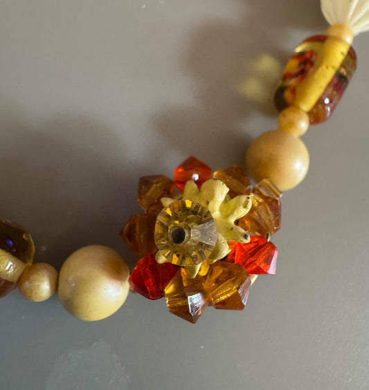 Flower clasp mixed media necklace