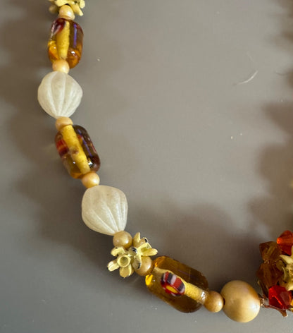 Flower clasp mixed media necklace