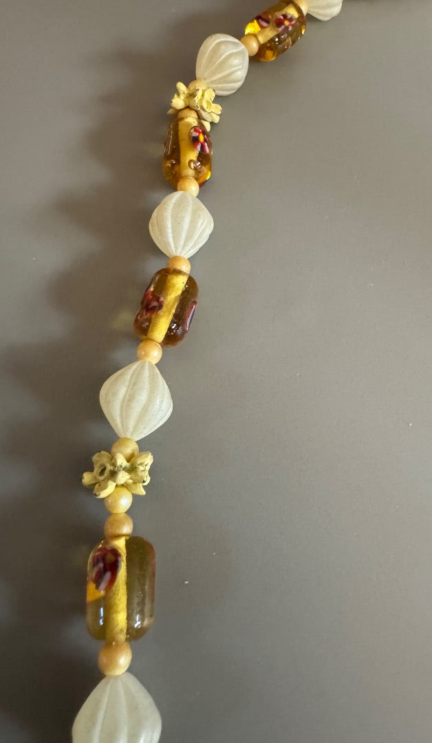 Flower clasp mixed media necklace