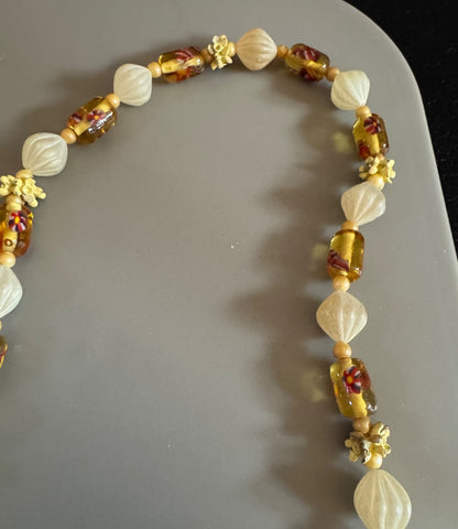 Flower clasp mixed media necklace