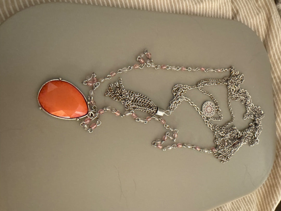 Multi strand silver tone peach necklace