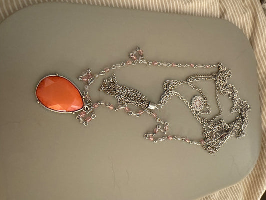 Multi strand silver tone peach necklace