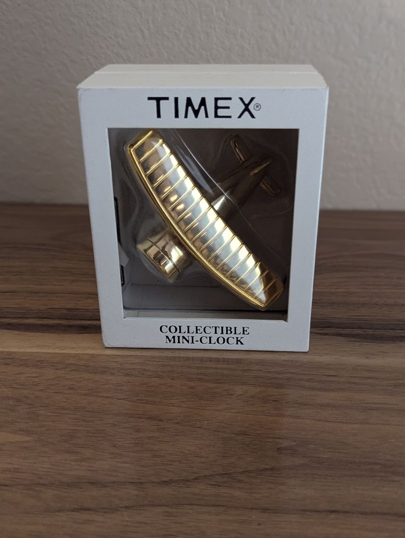 Timex Timex brass bi-plane desk clock