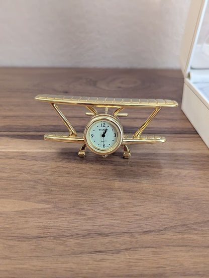 Timex Timex brass bi-plane desk clock