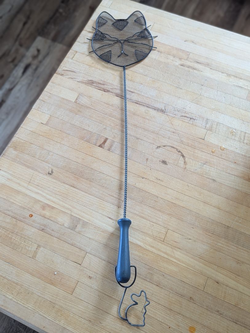 Kitty fly swatter