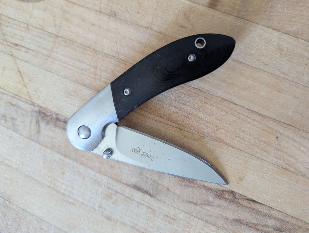 Kershaw black wood handle locking blade knife