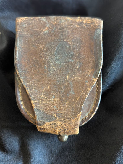 Old leather pocket watch or compass case