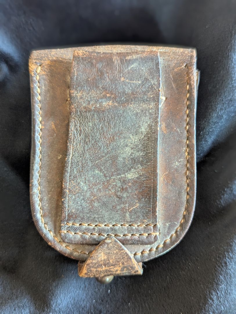 Old leather pocket watch or compass case
