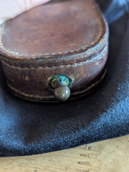 Old leather pocket watch or compass case