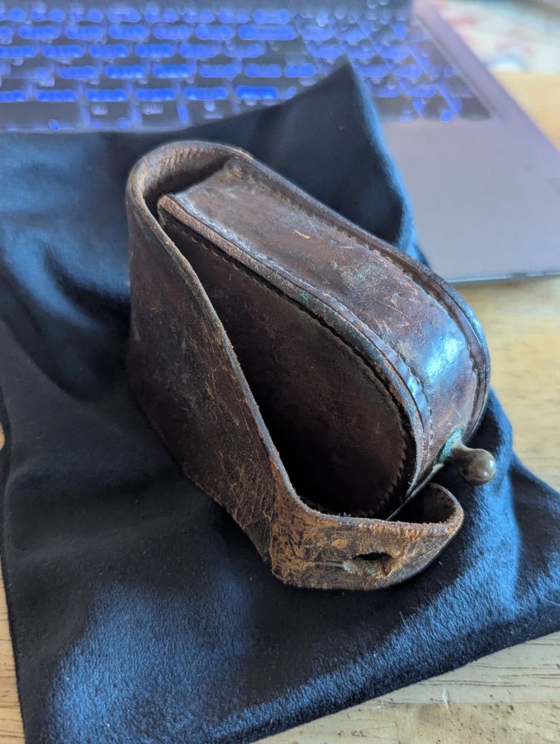 Old leather pocket watch or compass case