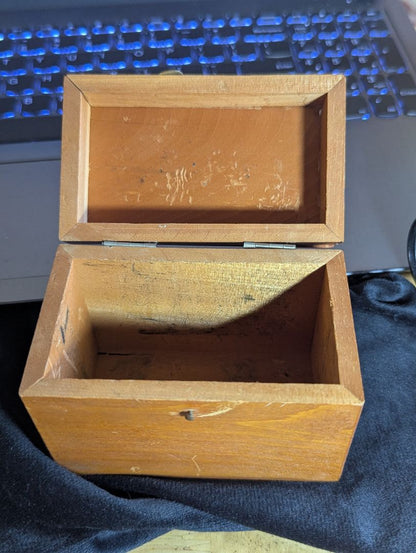 Vintage magnifyer with cast iron base and wood storage box