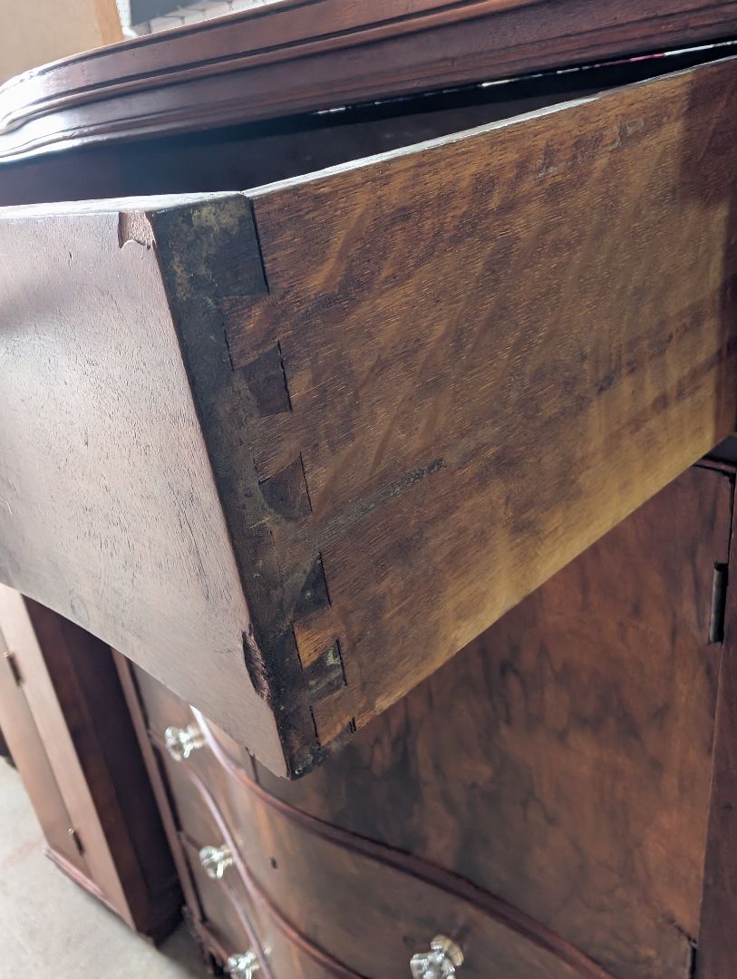 Antique Serpentine front chest of drawers