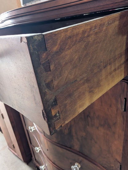 Antique Serpentine front chest of drawers